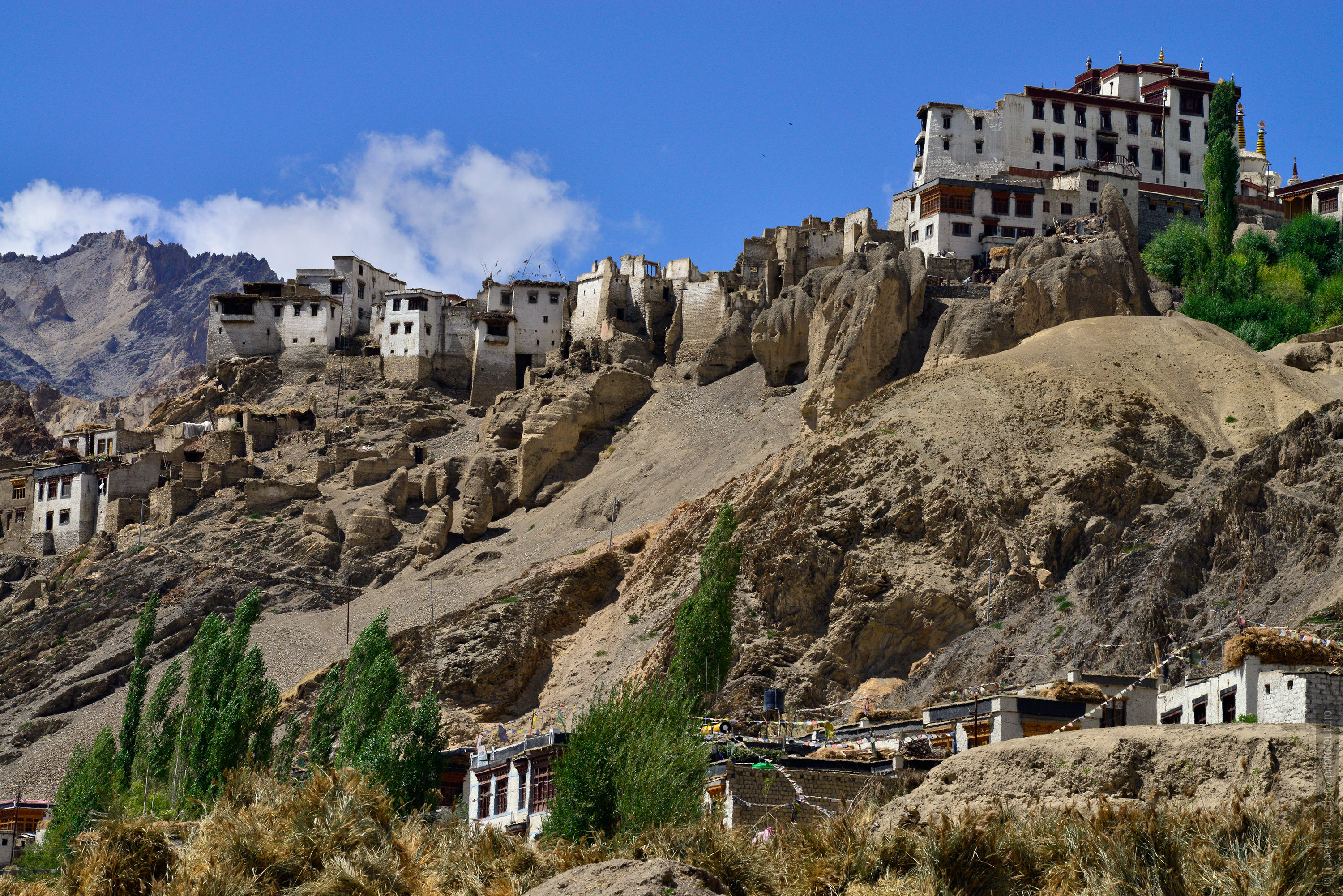 Village and Buddhist monastery Lamayuru Gonpa. Tour Tibet Lake Advertising: Alpine lakes, valley of geysers, Lamayuru, Colored Mountains, 01 - 10.09. 2023 year.
