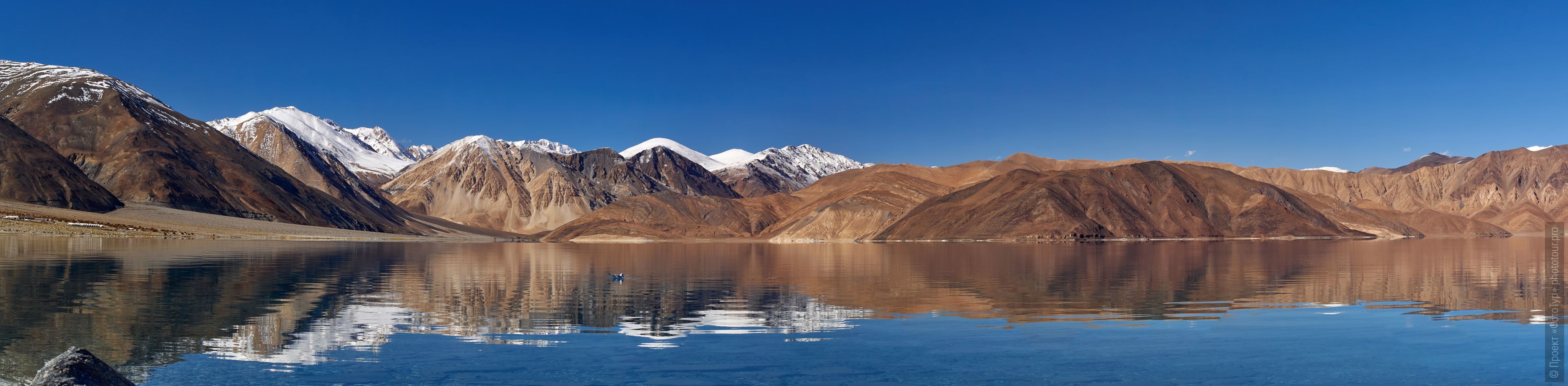 Pangong Tso Lake, Ladakh. Advertiser Tibet Lakes: Alpine lakes, geyser valley, Lamayuru, September 01 - 10.09. 2022 year.