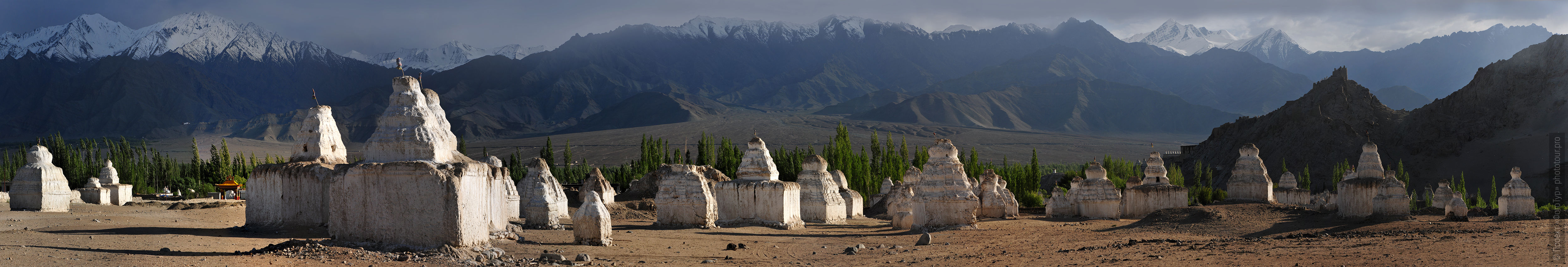 White stupas of Shay Gonpa. Tour Tibet Lakeside Advertising: Alpine lakes, geyser valley, Lamayuru, Colored Mountains, 01 - 10.09. 2022 year.